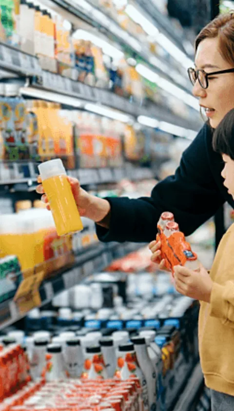 Mother and daughter at the grocery store