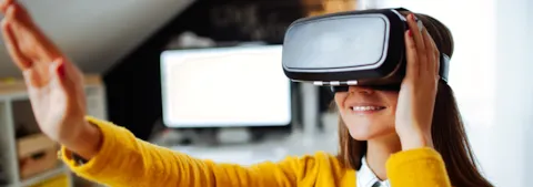 Woman using virtual reality glasses