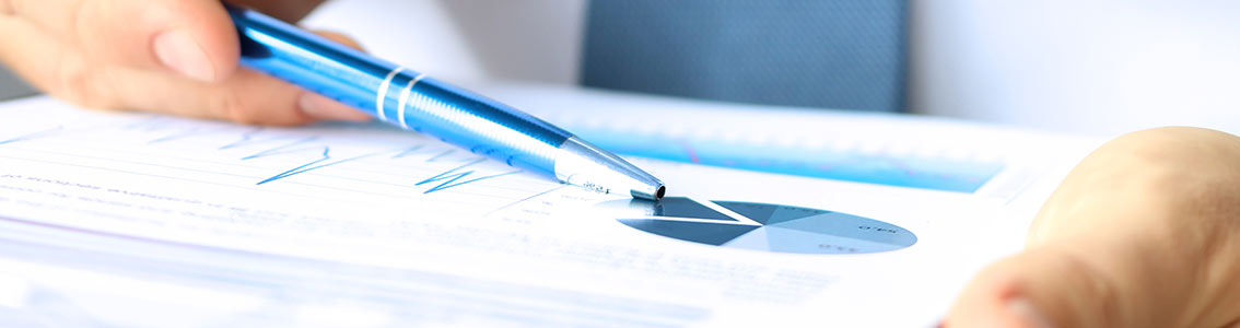 Man pointing to graphs